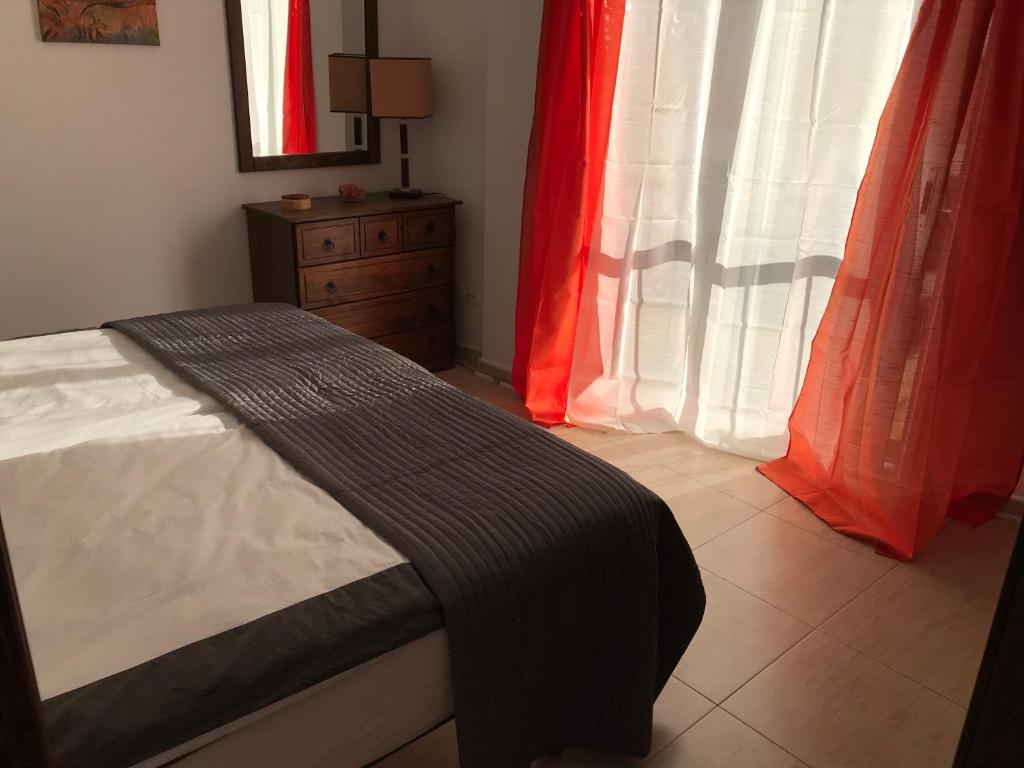 Postel nebo postele na pokoji v ubytování Apartamento Atico Guanchita