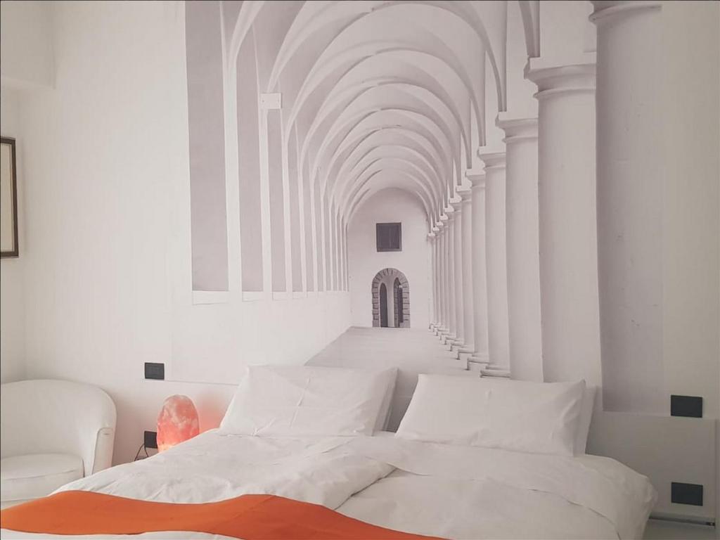 Łóżko lub łóżka w pokoju w obiekcie Tamb&B1