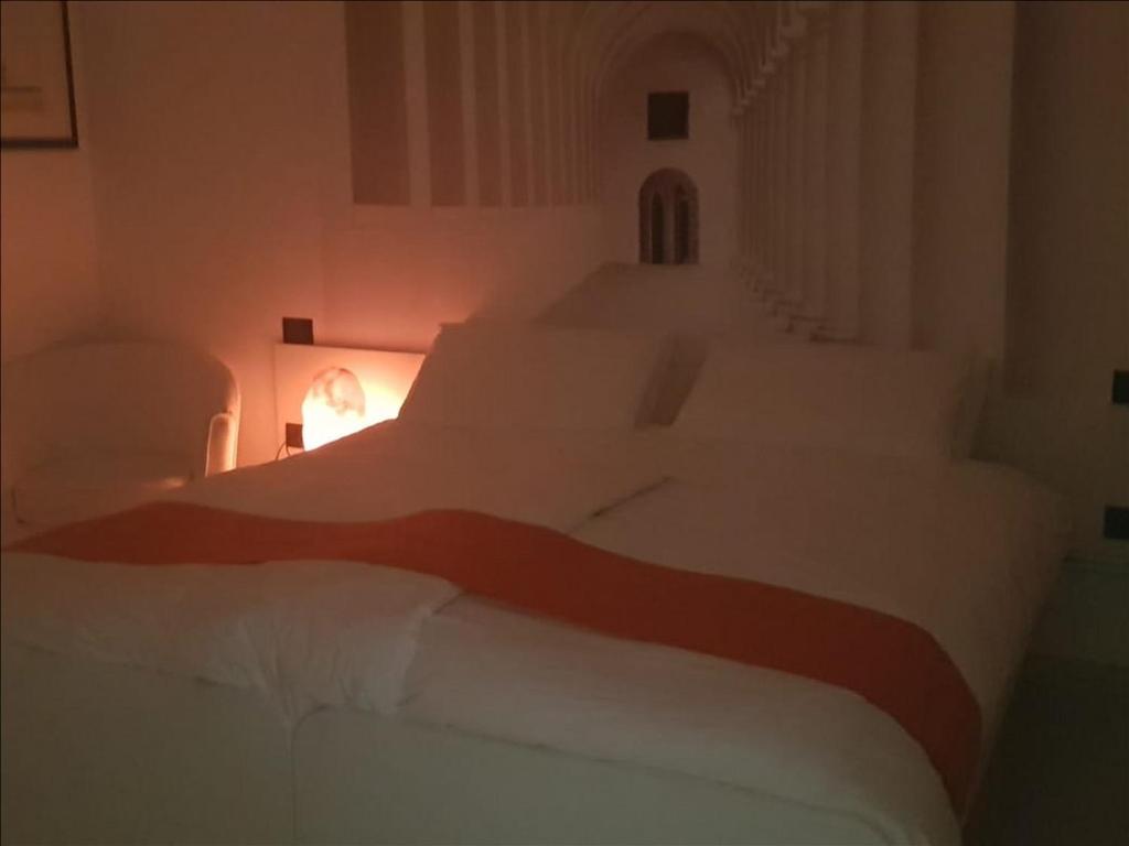 Łóżko lub łóżka w pokoju w obiekcie Tamb&B1