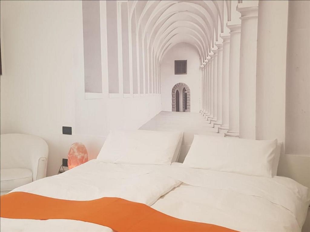 Łóżko lub łóżka w pokoju w obiekcie Tamb&B1