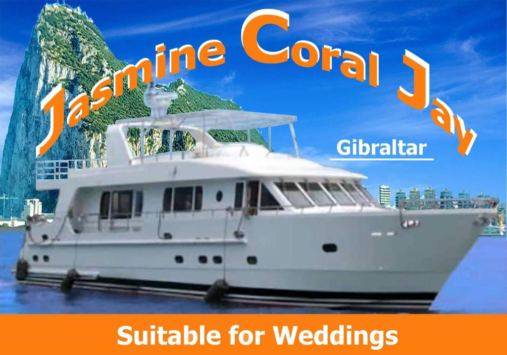 un barco blanco en el agua con las palabras "jamine coral" y "gillard" disponibles en JASMINE CORAL JAY Boutique Boatel Ocean Village en Gibraltar