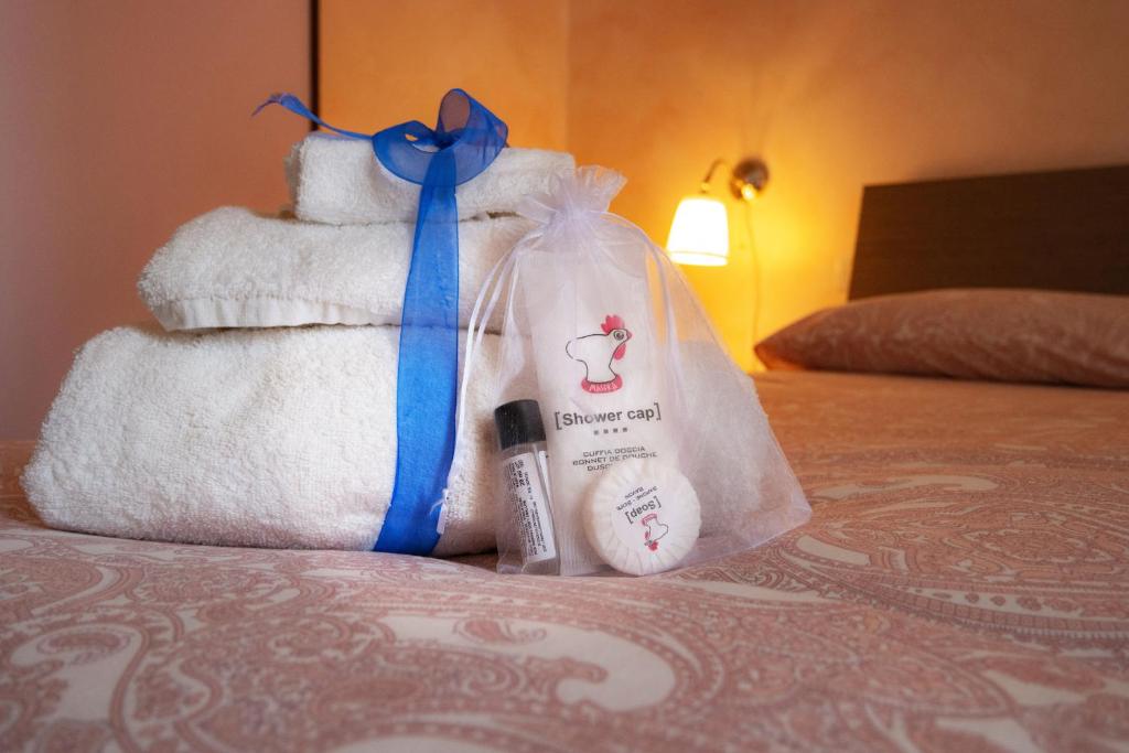 Postel nebo postele na pokoji v ubytování Il Nido del Grillaio Suite & Appartament