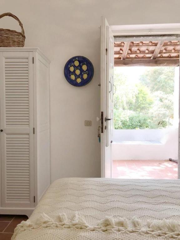 Łóżko lub łóżka w pokoju w obiekcie "Villa Le Cicale" Lipari