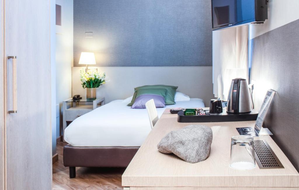 Postel nebo postele na pokoji v ubytování Hotel Oro Blu