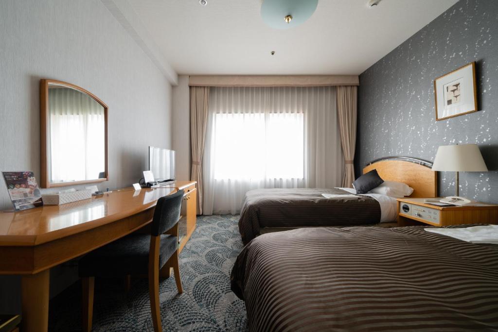 TV a/nebo společenská místnost v ubytování Hotel Okura Niigata
