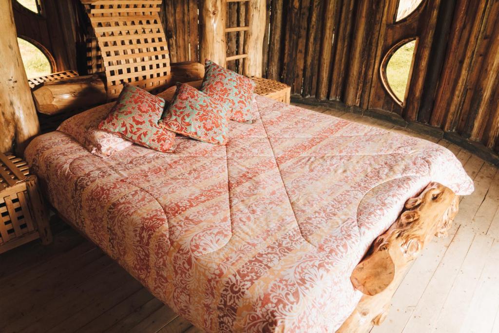 Postel nebo postele na pokoji v ubytování Hostal La Laguna