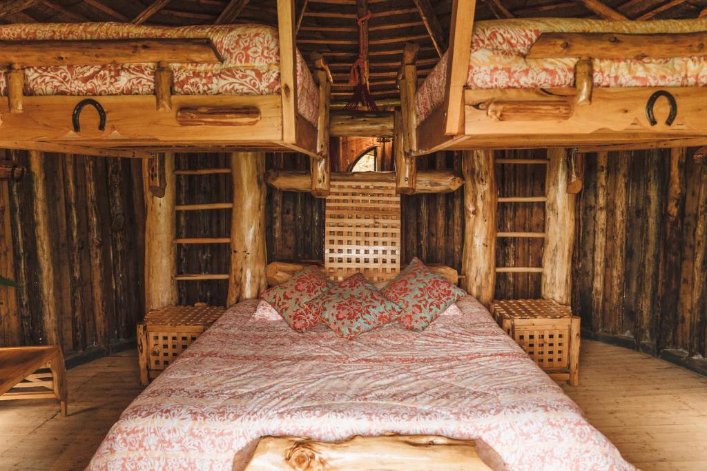Postel nebo postele na pokoji v ubytování Hostal La Laguna