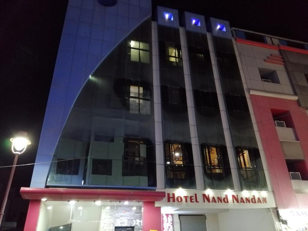 a view of the hotel nandan mandapa at night at Hotel Nandnandan in Dwarka