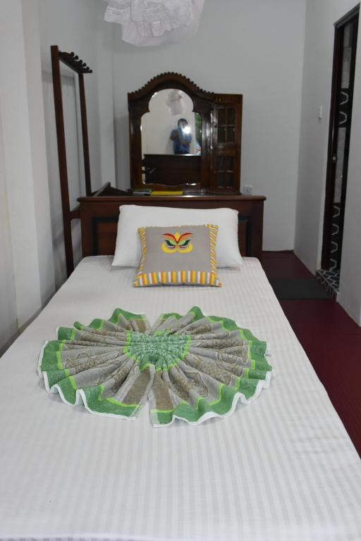 Postel nebo postele na pokoji v ubytování Baagie Homestay