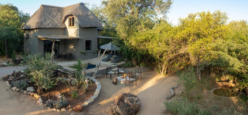 an aerial view of a house with a garden at The Bush House in Hoedspruit