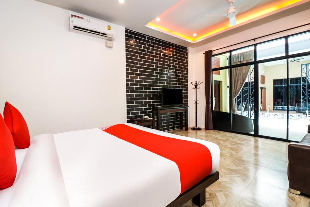 Postel nebo postele na pokoji v ubytování Baan Noppadol Hua Hin Loft