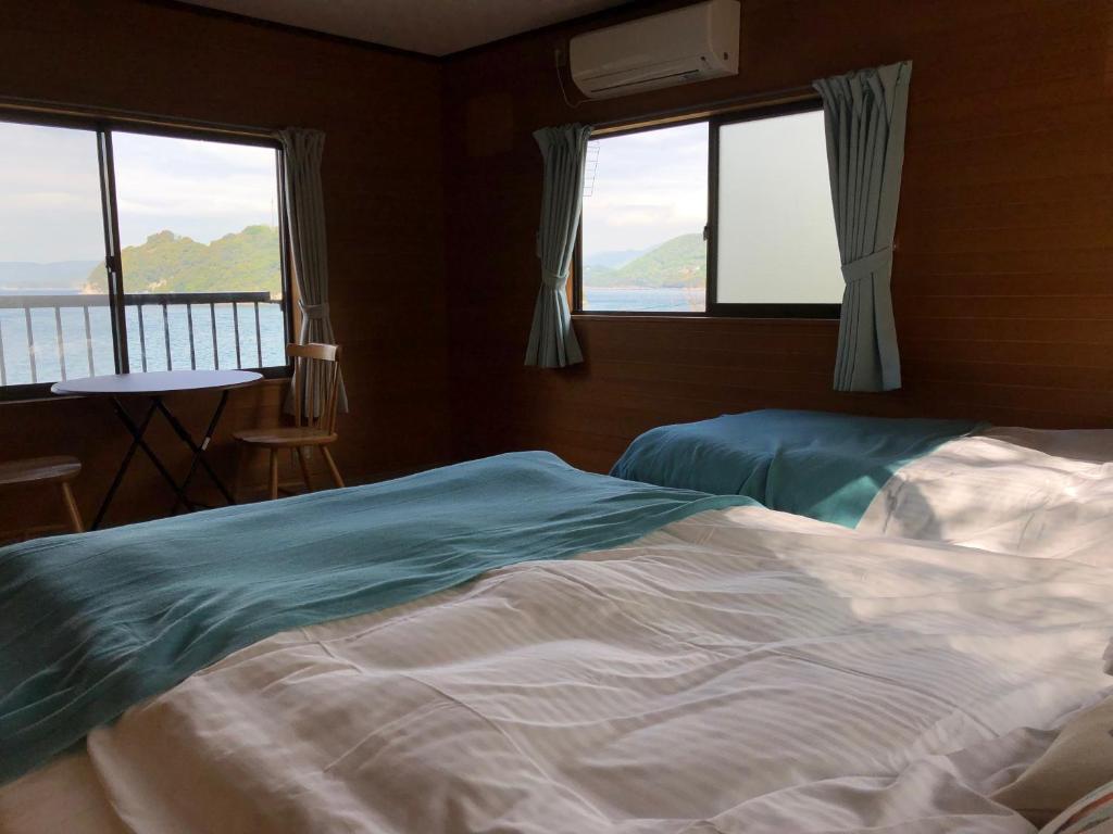 Postel nebo postele na pokoji v ubytování villa chillon