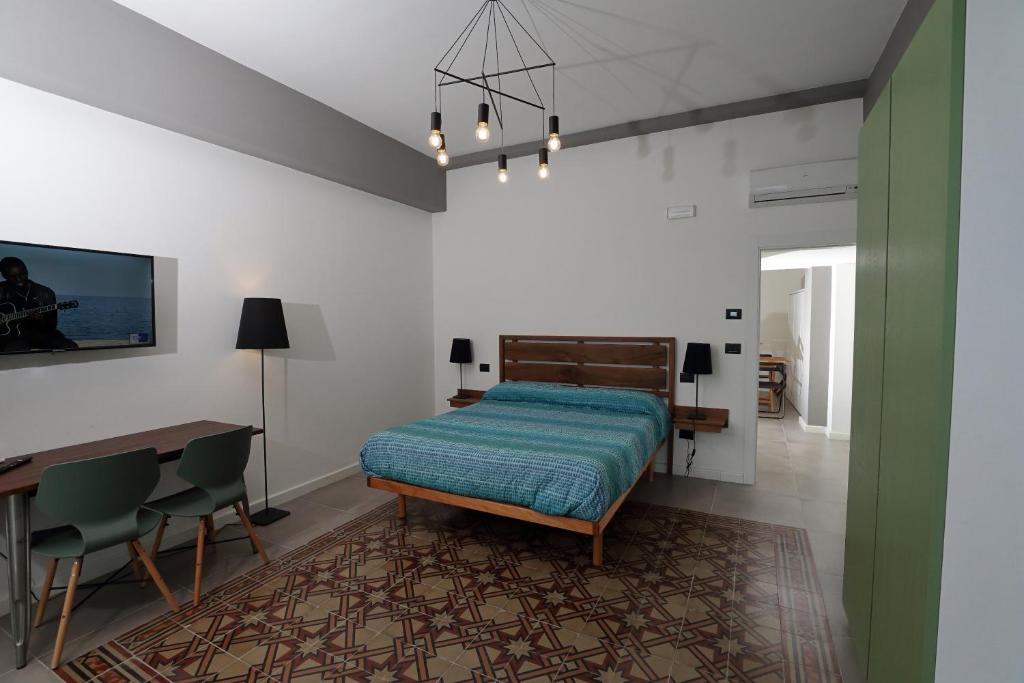 Postel nebo postele na pokoji v ubytování Timpa rooms