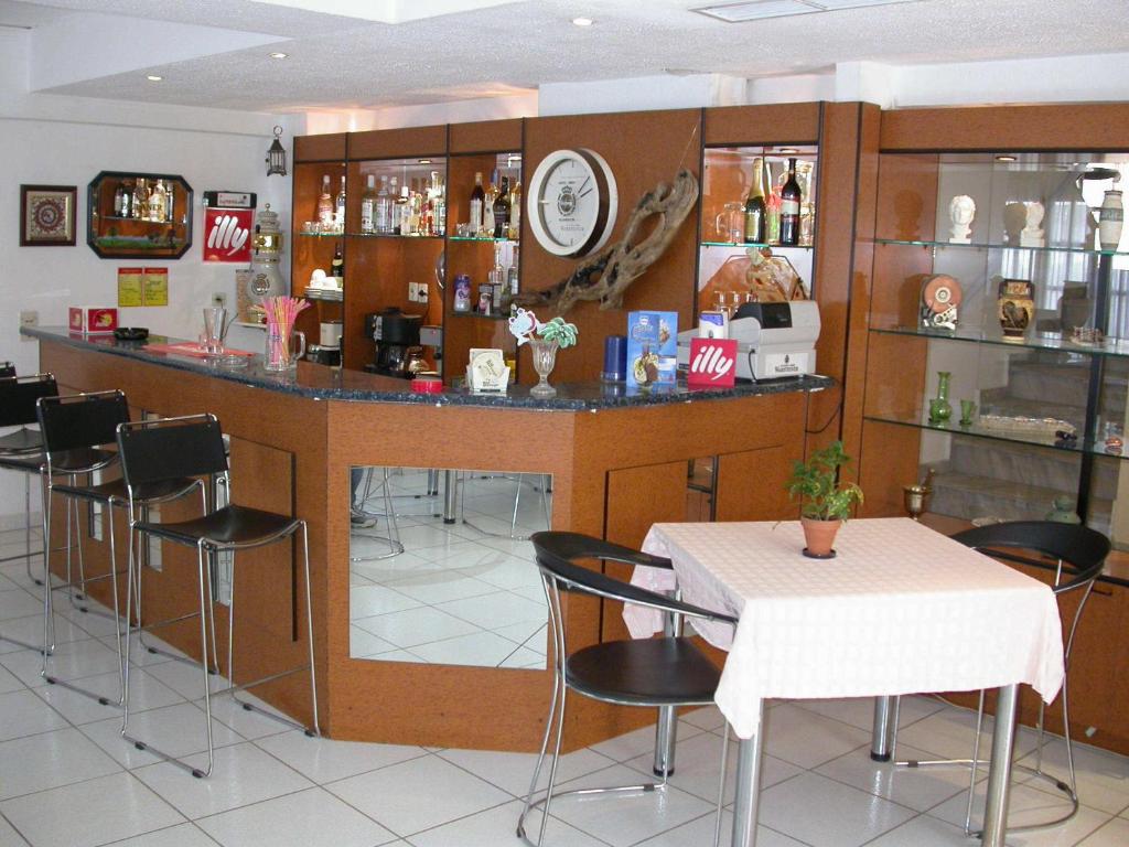 The lounge or bar area at Emily Hotel
