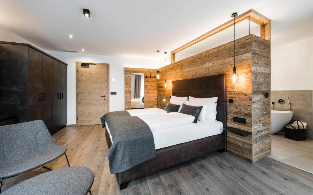 Postel nebo postele na pokoji v ubytování matill - timeless boutique retreat