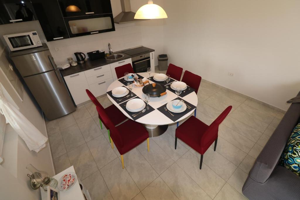 Kuchnia lub aneks kuchenny w obiekcie Apartman La maison