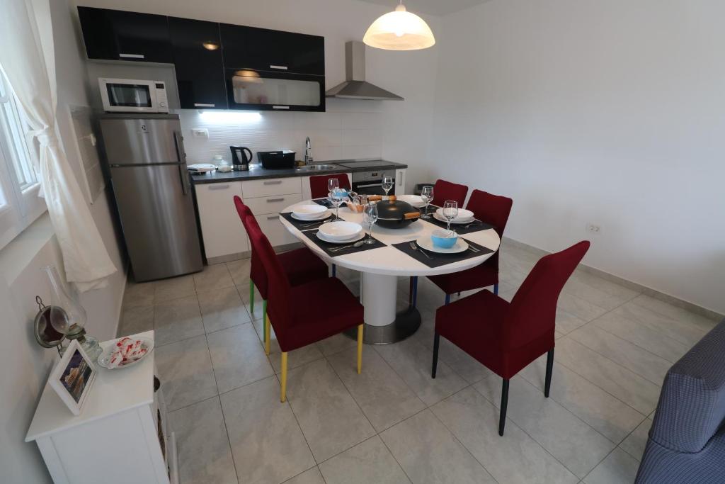 Kuchnia lub aneks kuchenny w obiekcie Apartman La maison
