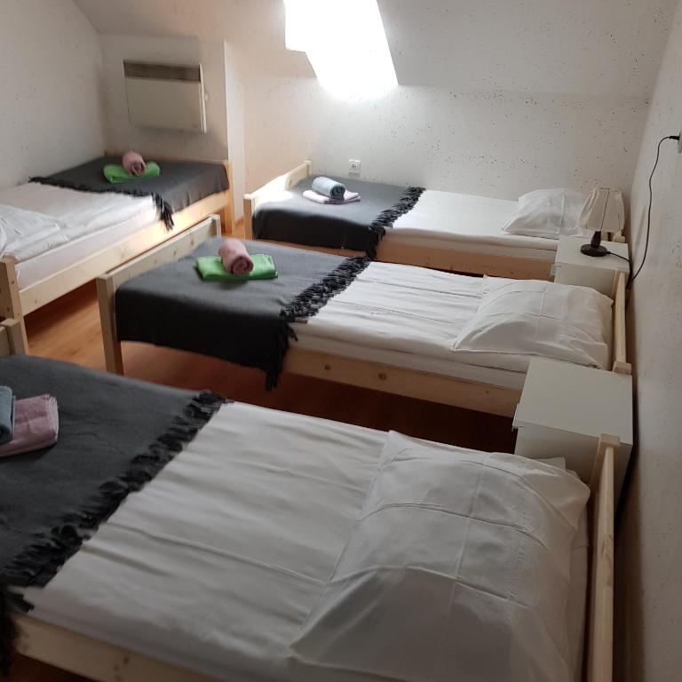 Postel nebo postele na pokoji v ubytování Guesthouse Osvald