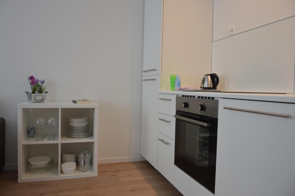 Kuchnia lub aneks kuchenny w obiekcie Appartamento Sunrise - Centro Storico N1