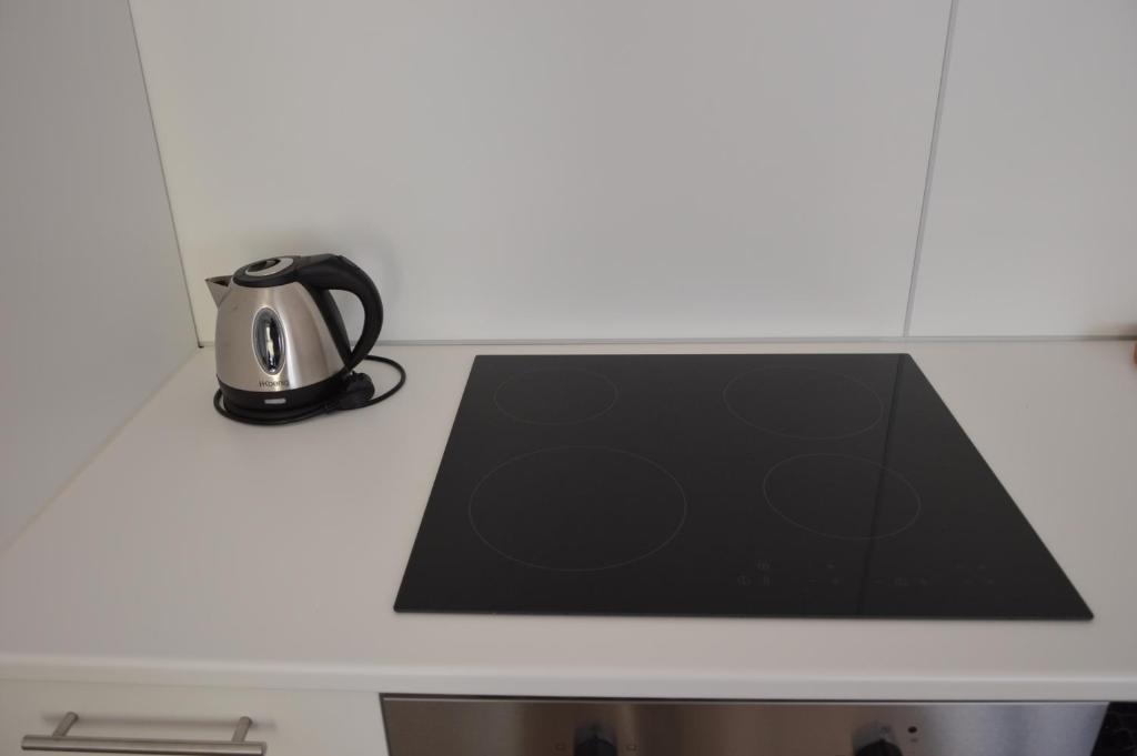 Zestaw do parzenia kawy i herbaty w obiekcie Appartamento Sunrise - Centro Storico N1