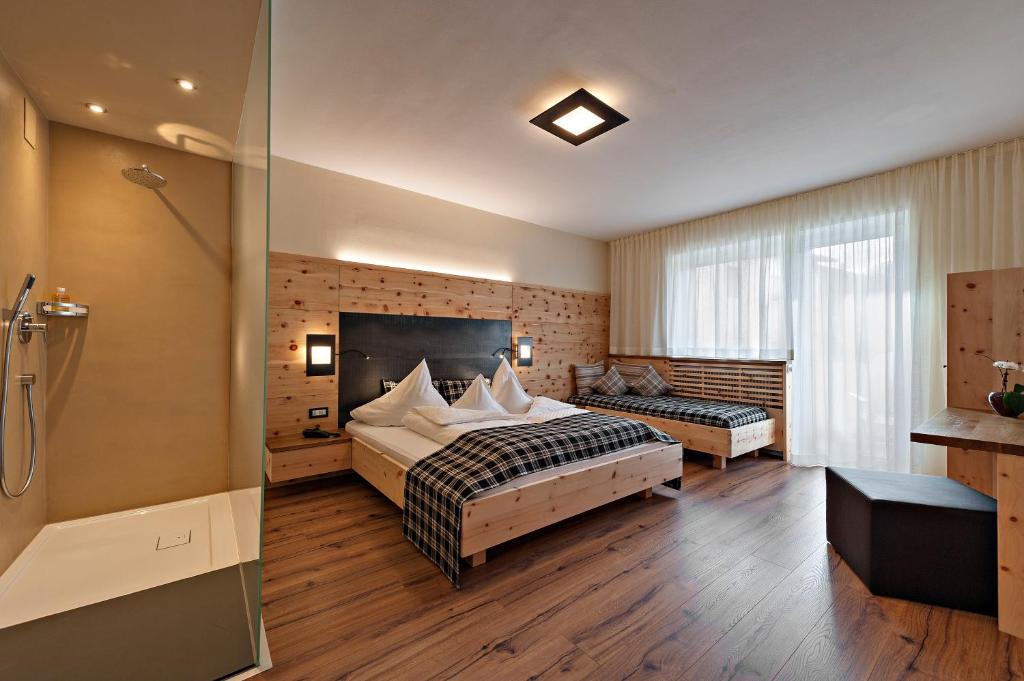Postel nebo postele na pokoji v ubytování matill - timeless boutique retreat
