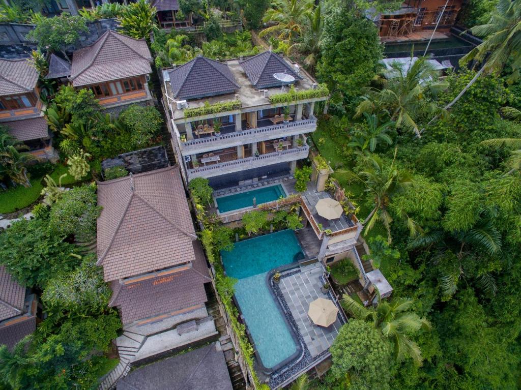 Bazén v ubytování Ubud Paras Villa nebo v jeho okolí