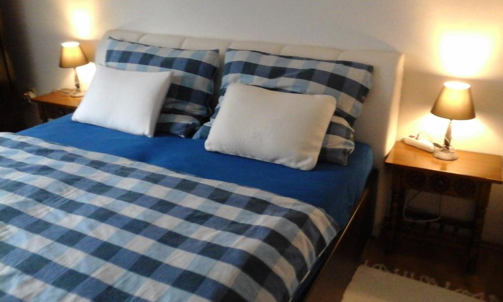 Postel nebo postele na pokoji v ubytování Modrý Dům