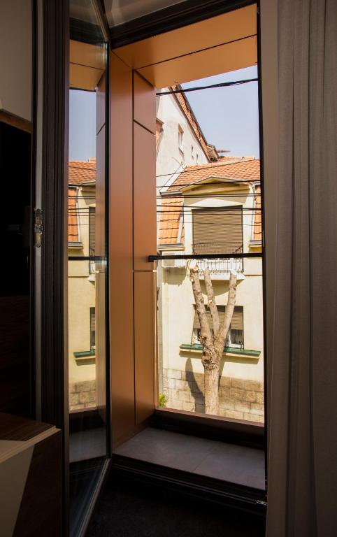Balkón nebo terasa v ubytování BOUTIQUE 25h by Eva stay 018