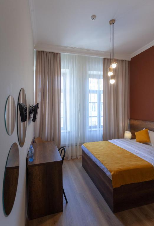 Postel nebo postele na pokoji v ubytování Hotel Avenue 106