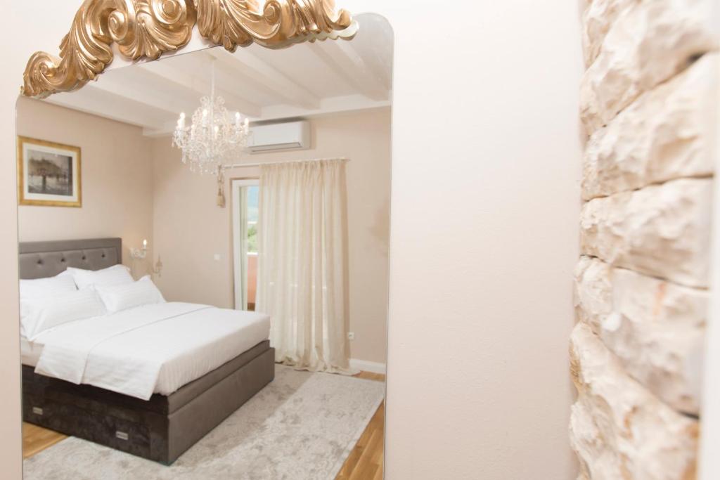 Postel nebo postele na pokoji v ubytování San Mihael luxury rooms 1
