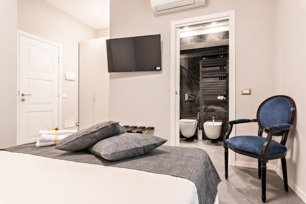 Posteľ alebo postele v izbe v ubytovaní Benso Rooms