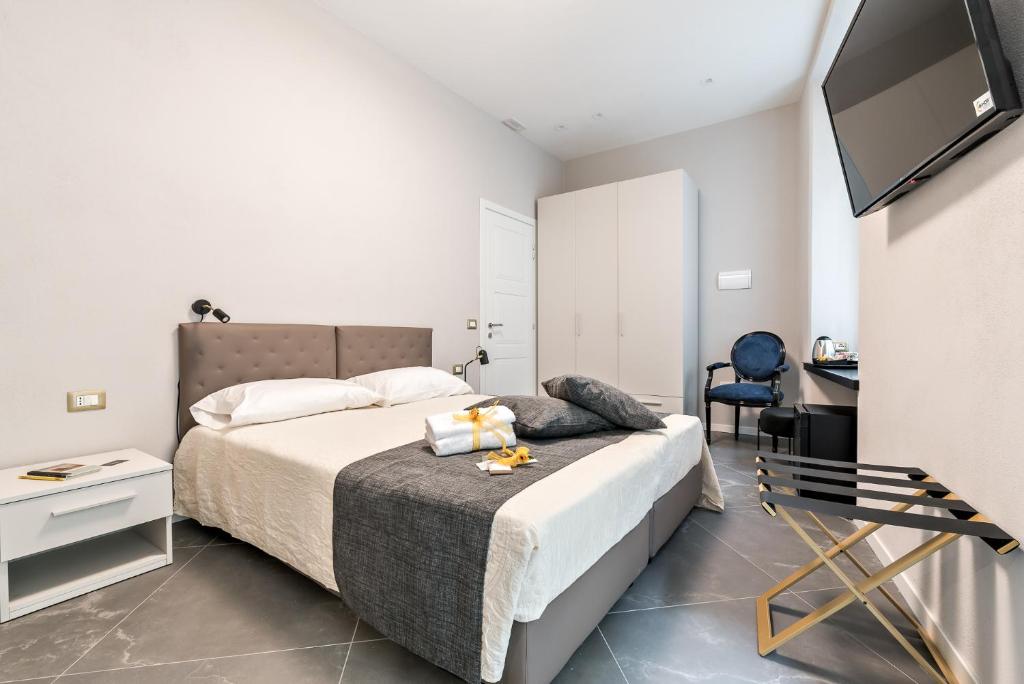 Posteľ alebo postele v izbe v ubytovaní Benso Rooms