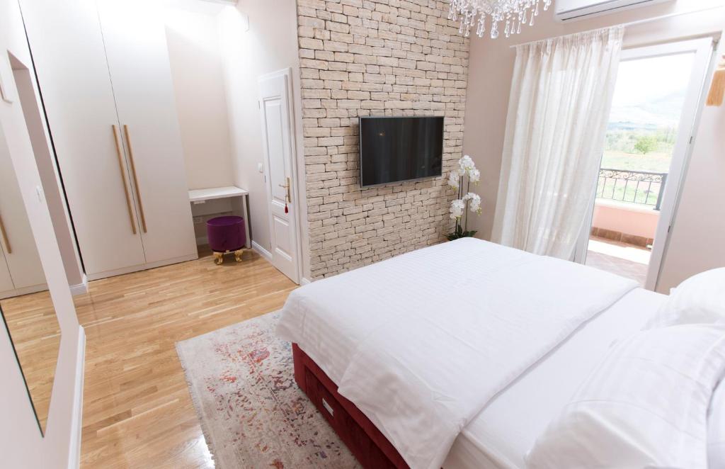 Postel nebo postele na pokoji v ubytování San Mihael luxury rooms 1