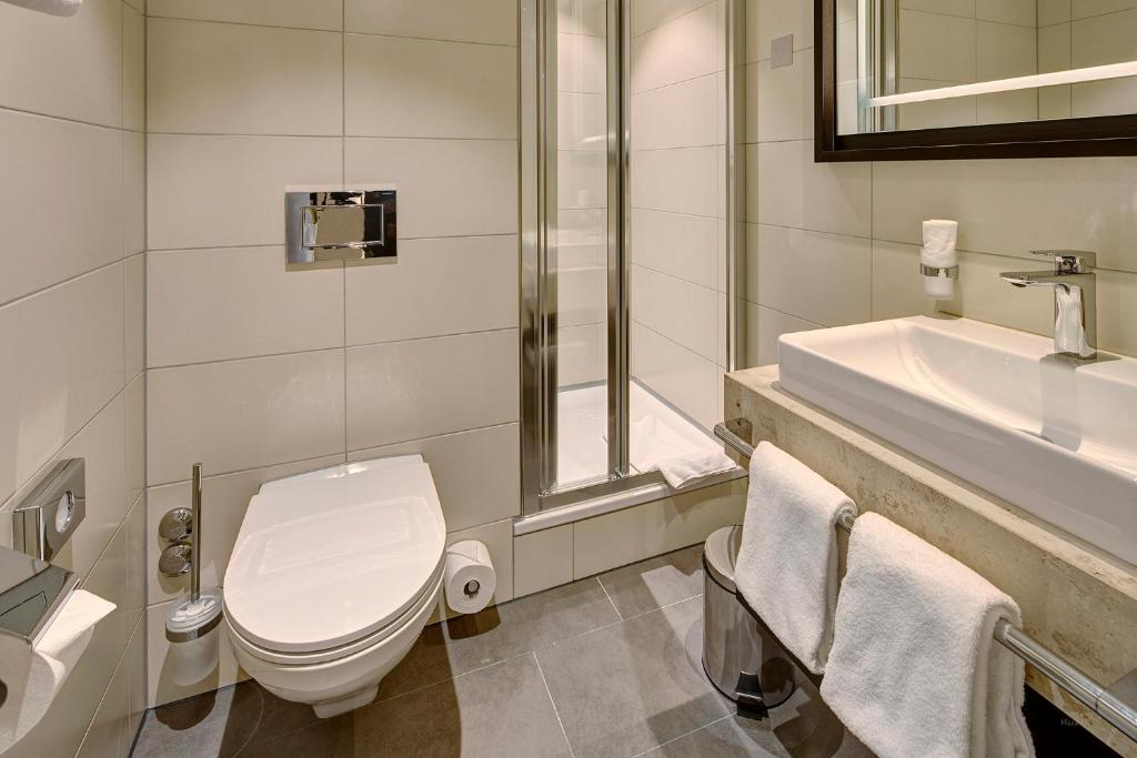Koupelna v ubytování Hotel Alpina Luzern
