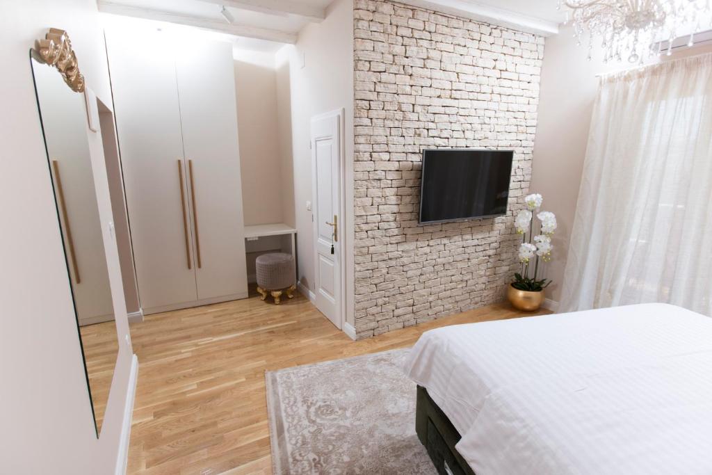TV a/nebo společenská místnost v ubytování San Mihael luxury rooms 1