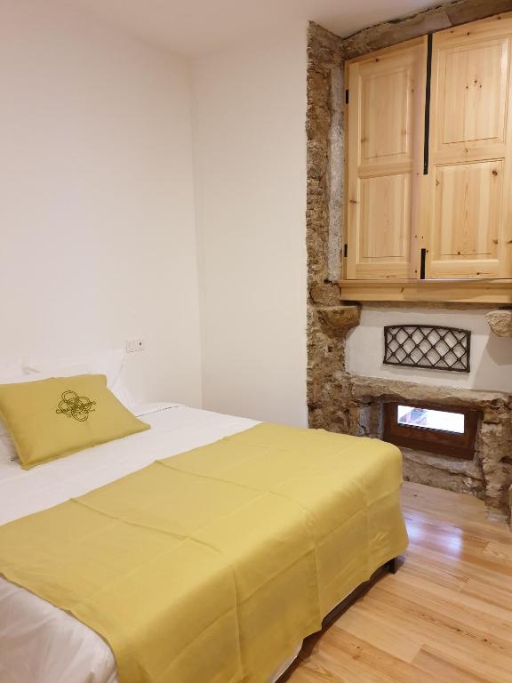 Postel nebo postele na pokoji v ubytování Casa da Baixa by PURUS