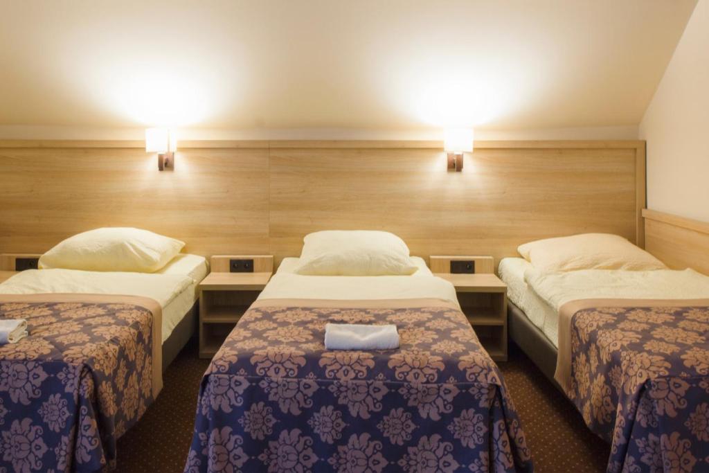 Postel nebo postele na pokoji v ubytování Motel DB2000