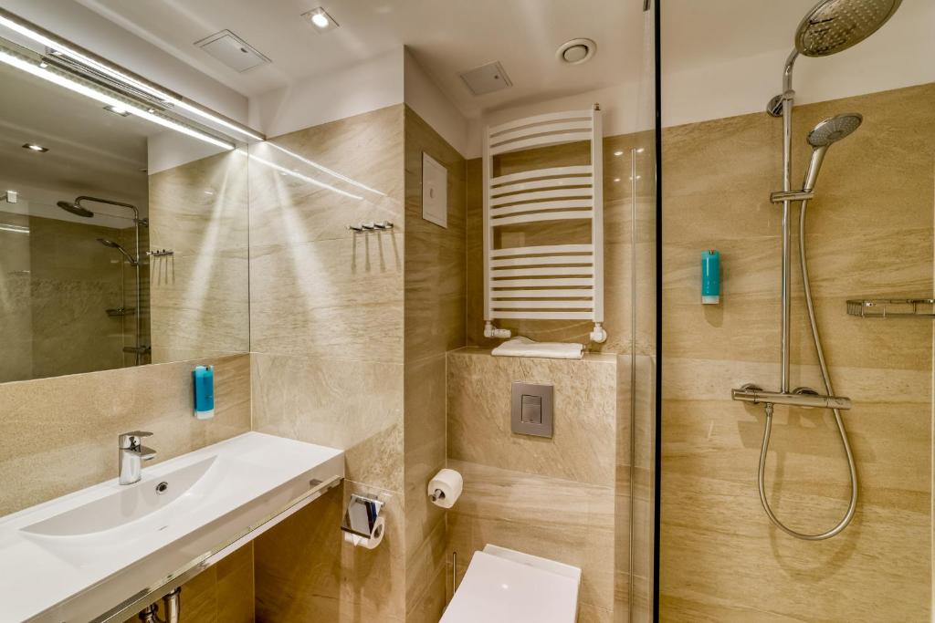 Koupelna v ubytování Hotel White