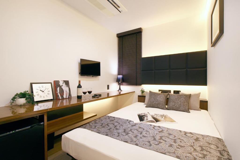 TV a/nebo společenská místnost v ubytování Hotel DUO kinsicho
