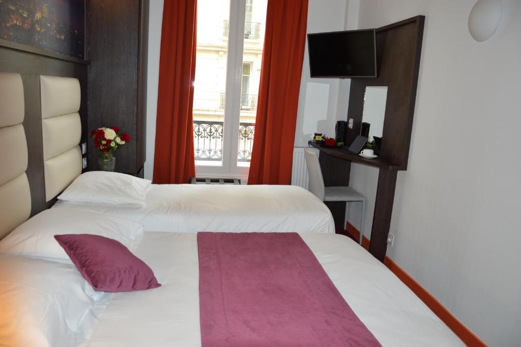 Un ou plusieurs lits dans un hébergement de l'établissement Parc Hotel
