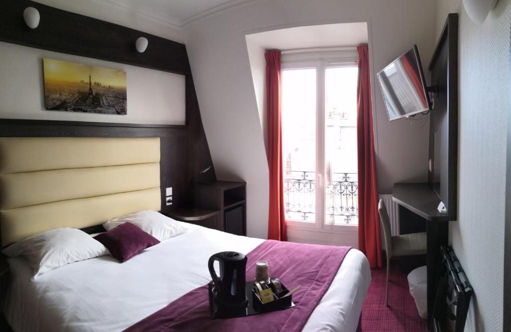 Un ou plusieurs lits dans un hébergement de l'établissement Parc Hotel