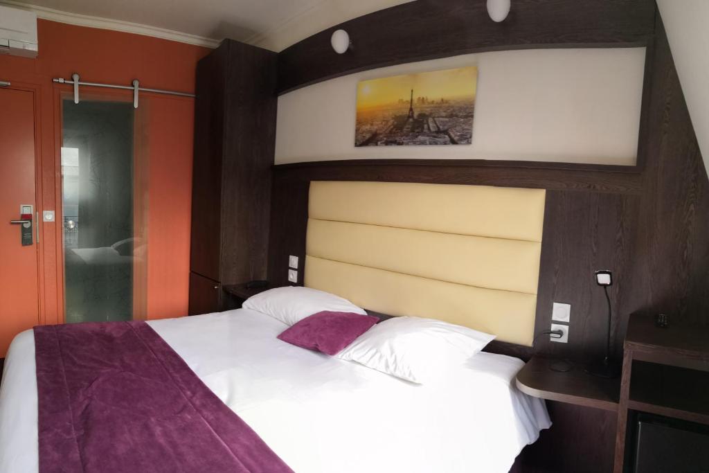 Un ou plusieurs lits dans un hébergement de l'établissement Parc Hotel