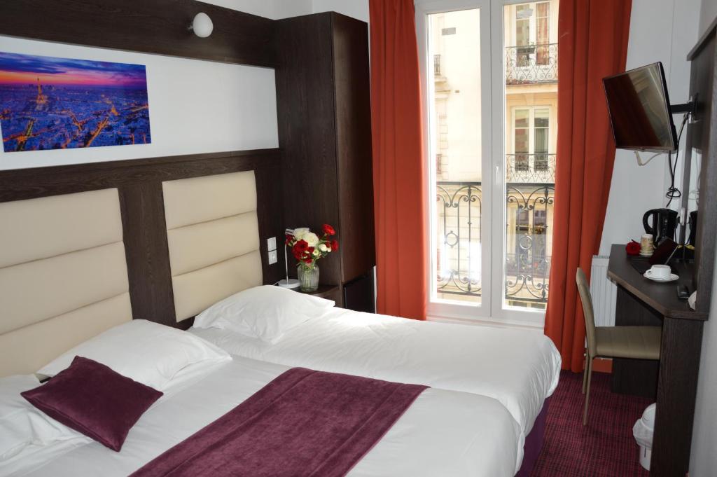 Un ou plusieurs lits dans un hébergement de l'établissement Parc Hotel