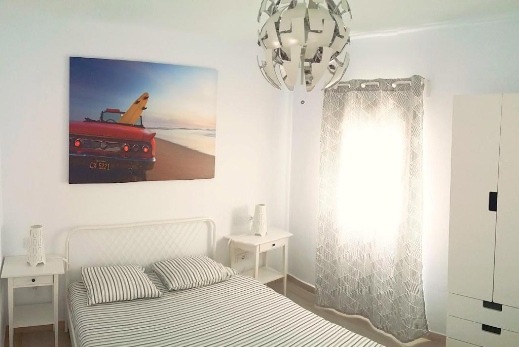 Postel nebo postele na pokoji v ubytování Kotikó 18