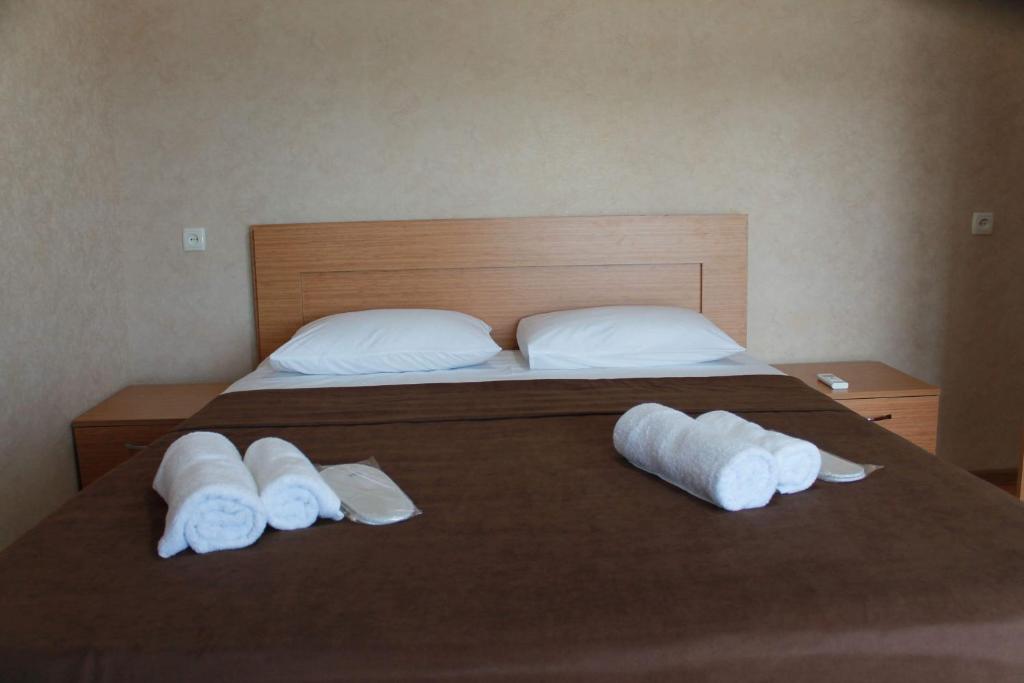 Llit o llits en una habitació de Guest House Maradona