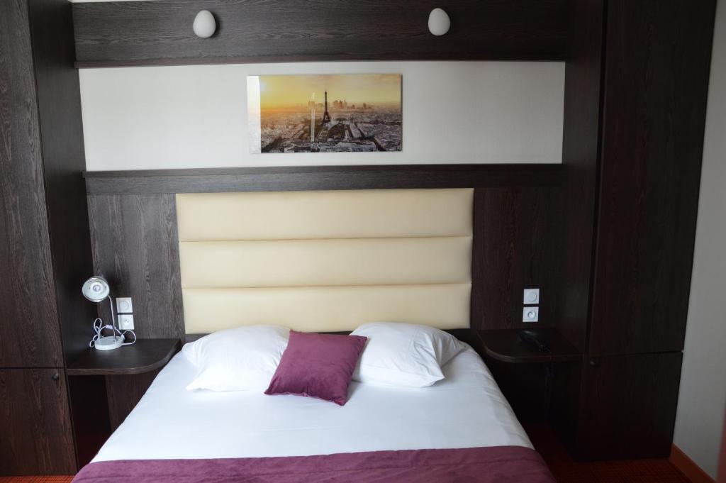 Un ou plusieurs lits dans un hébergement de l'établissement Parc Hotel