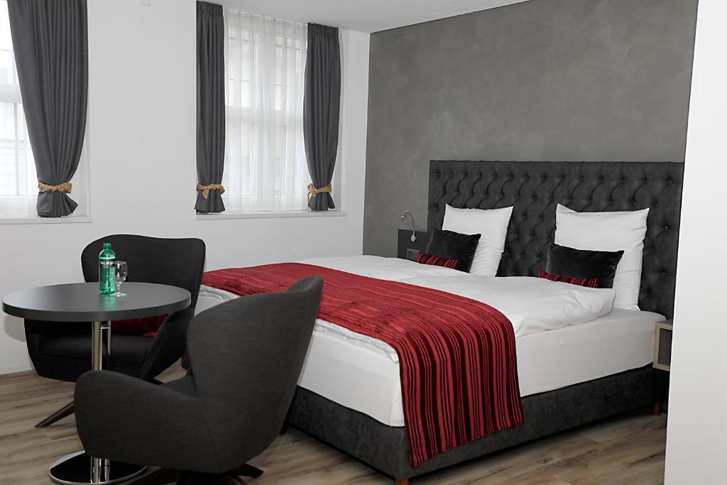 Postel nebo postele na pokoji v ubytování Business Apartments Reichenburg