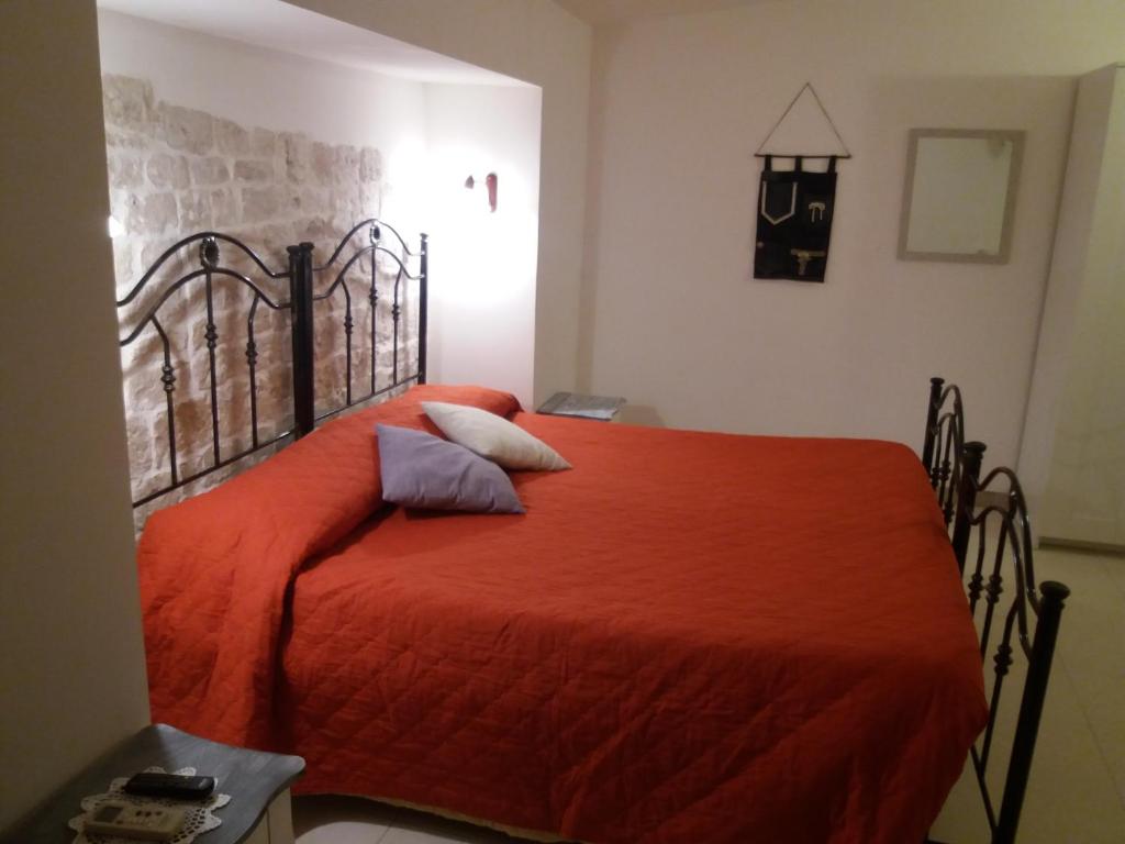 Postel nebo postele na pokoji v ubytování Il rifugio del conte