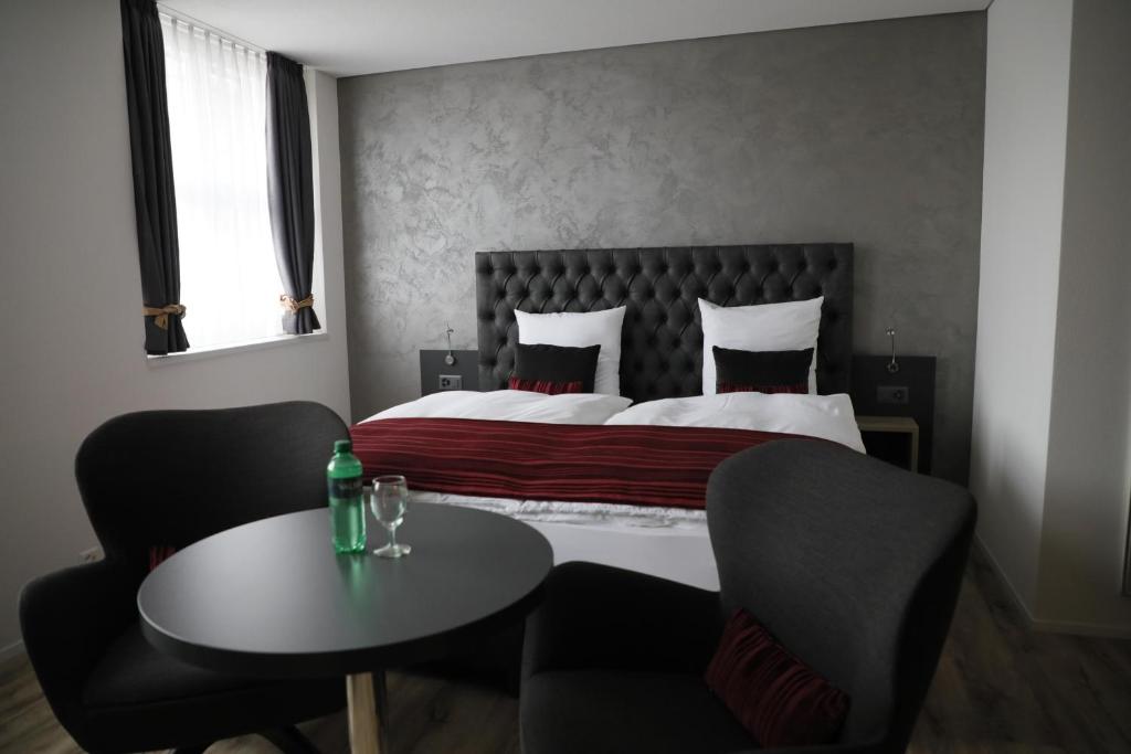 Postel nebo postele na pokoji v ubytování Business Apartments Reichenburg