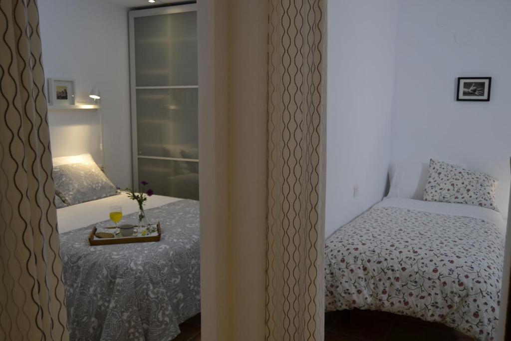 Postel nebo postele na pokoji v ubytování El Librero de La Alhambra